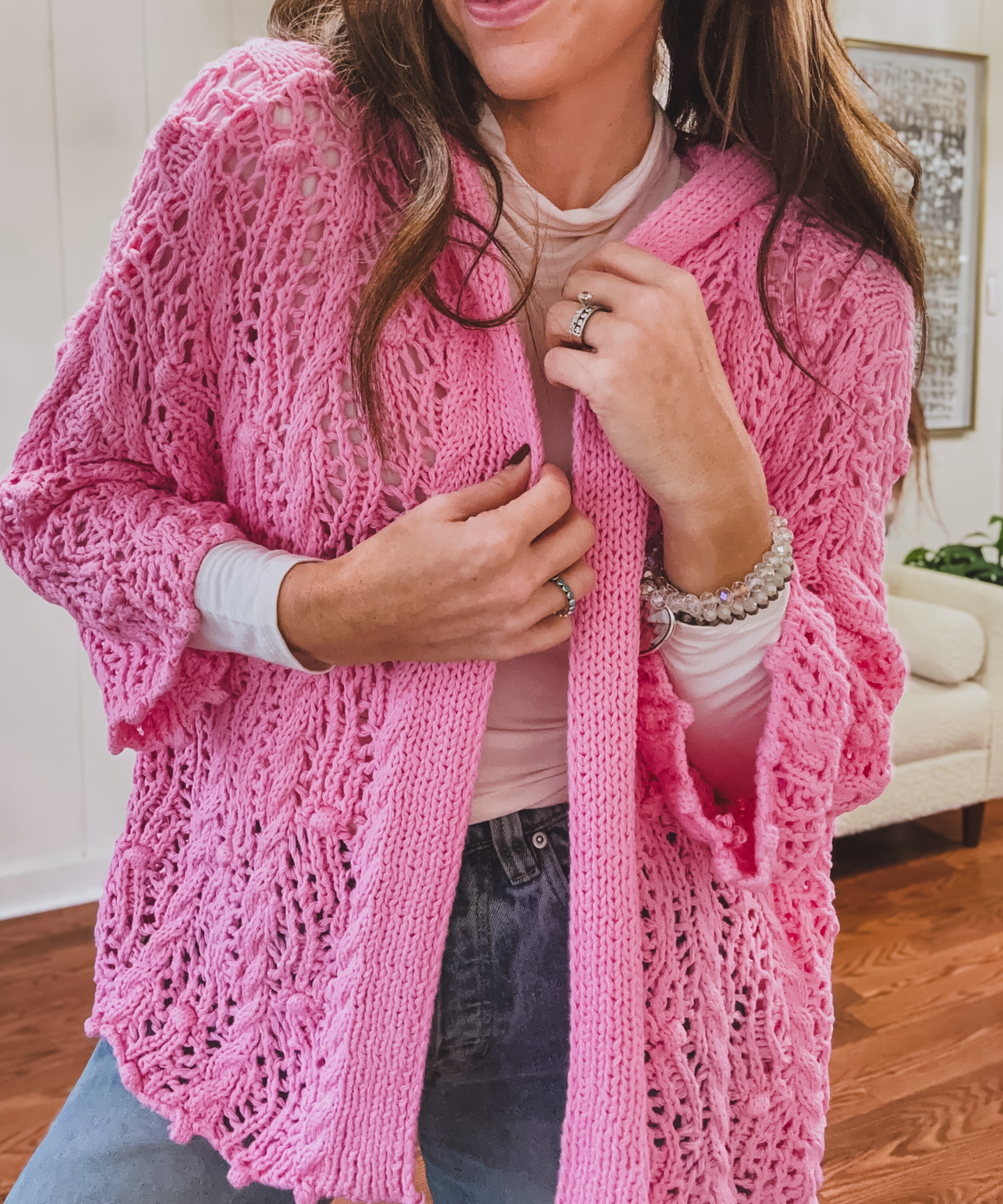 Crochet open weave, open front cardigan with hood.