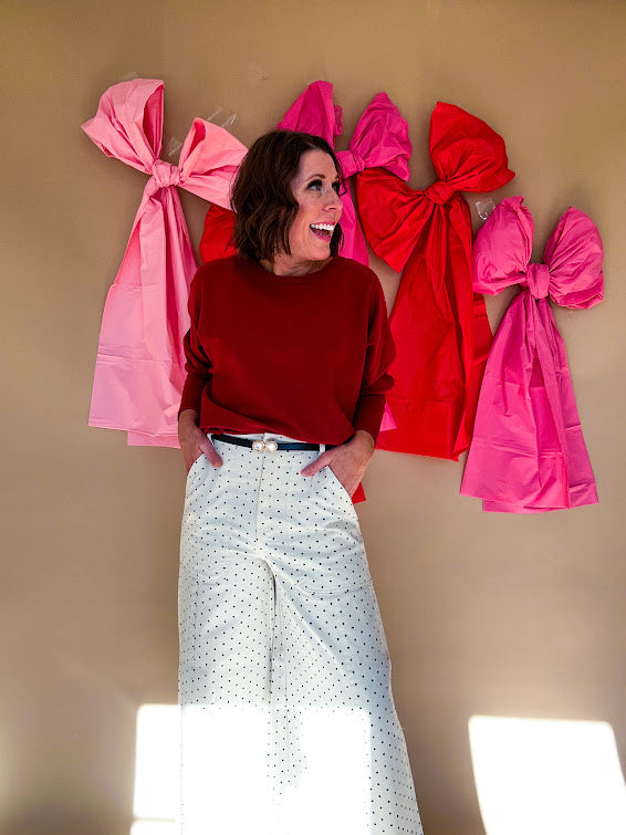 Crew neck sweater pullover with dolman sleeves.