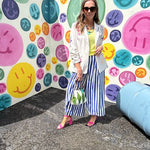 Blue and white striped wide leg pants with elastic back waist and flat front with large side pockets.