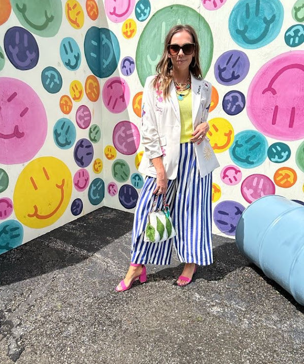 Blue and white striped wide leg pants with elastic back waist and flat front with large side pockets.