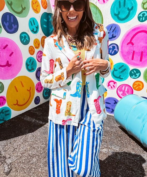 Lightweight white blazer with multi colored cowboy boots throughout and side pockets with lapel collar.