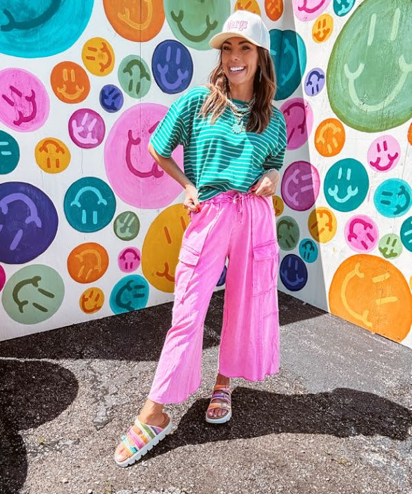 Cotton terry wide leg pants in mineral washed bubble gum pink with elastic drawstring waist, oversized pockets and raw seams.