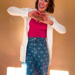 Lightweight, open front cardigan with wide ribbed trim and cuffs and pockets.