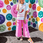Cotton terry wide leg pants in mineral washed bubble gum pink with elastic drawstring waist, oversized pockets and raw seams.