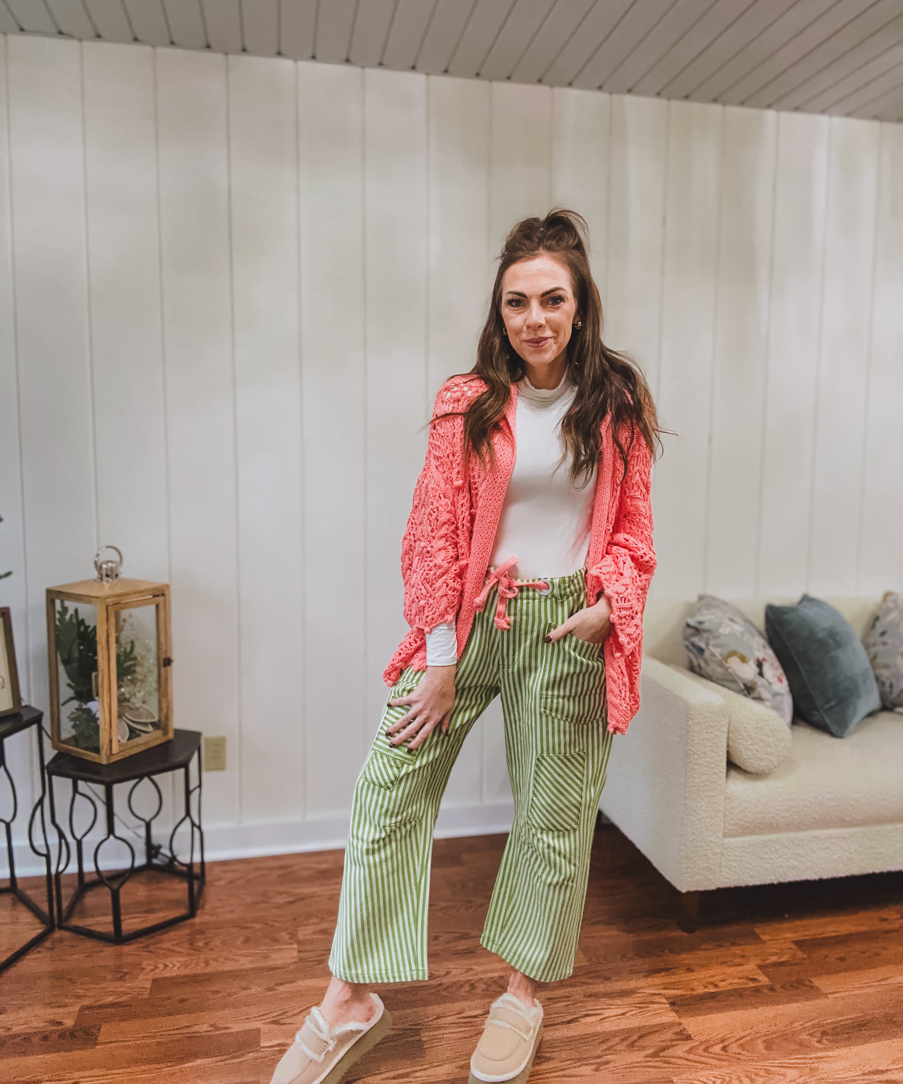 Twill barrel pant in green and white vertical stripe with pockets and contrasting coral drawstring waist.