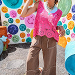 Relaxed fit crochet tank with a sheer, open weave.