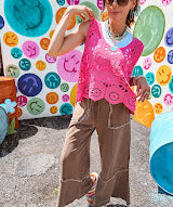 Relaxed fit crochet tank with a sheer, open weave.