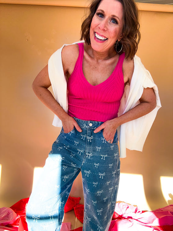 Soft, V neck front and back tank with thin straps. Available in many colors.