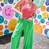 Linen and cotton blend flowy wide leg pants with elastic waist, pockets and frayed hem and pockets.