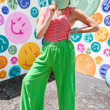Linen and cotton blend flowy wide leg pants with elastic waist, pockets and frayed hem and pockets.