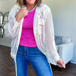 Cream windowpane jacket with dainty pink floral patchwork throughout and matching hoodie with button down front and drawstring waist.