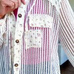 Cream windowpane jacket with dainty pink floral patchwork throughout and matching hoodie with button down front and drawstring waist.