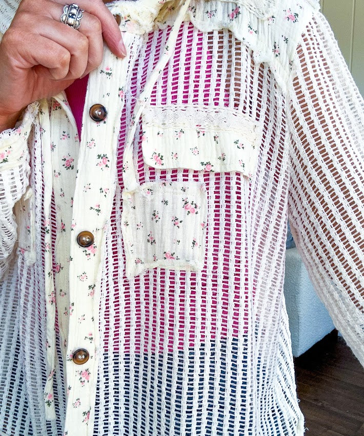 Cream windowpane jacket with dainty pink floral patchwork throughout and matching hoodie with button down front and drawstring waist.