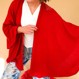 Warm red soft shawl with a sequined strap for a pull through, wrap design.