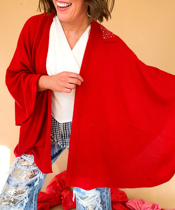 Warm red soft shawl with a sequined strap for a pull through, wrap design.