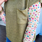 Cream multi colored polka dot long sleeved mesh with round neck.