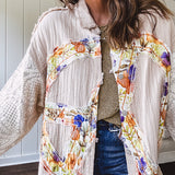 Beige cotton shacket with floral peace patch across the front, lace sleeves and metal buttons down the front. Oversized.