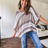 Soft open weave drop shoulder pullover with taupe, dark grey and white striping throughout, V neck design front and back and oversized fit.