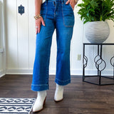 Stretchy medium wash utility style cropped denim with a high rise.