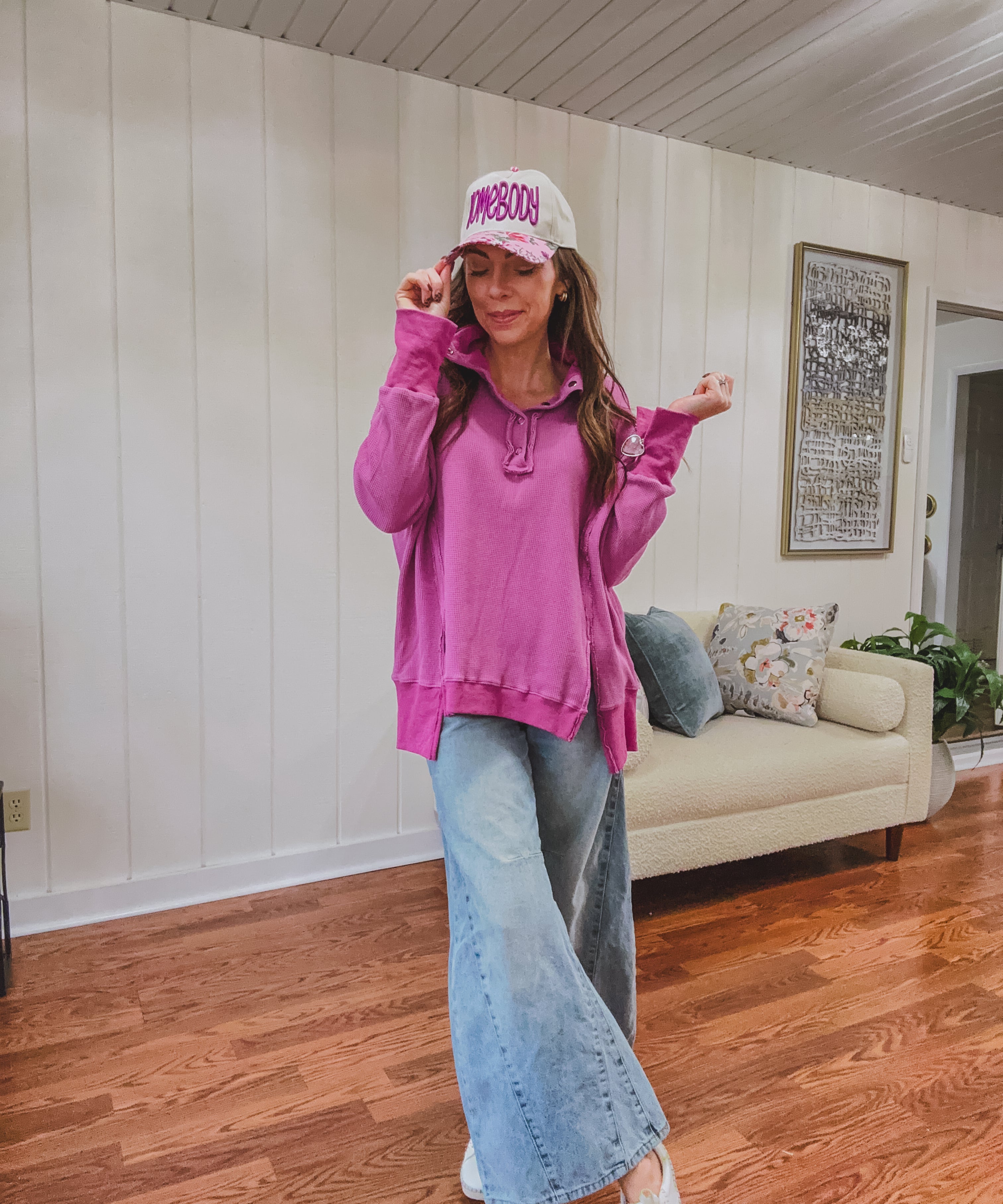 Orchid Henley top with snap button neck and collar and split front seam.