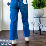 Stretchy medium wash utility style cropped denim with a high rise.