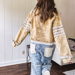 Lightweight antique bronze washed zip up denim jacket with exposed seams, ivory lace detail throughout, 3D pockets on the front, strap adjustable cuffs and lace trim at the hem.