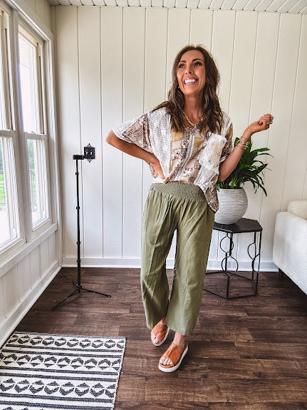 Lightweight and flowy beige patchwork printed tee with V neck, raw seams and cream lace inserts and floral crochet floral patch on the front pocket.
