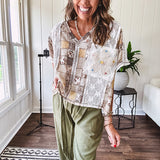 Lightweight and flowy beige patchwork printed tee with V neck, raw seams and cream lace inserts and floral crochet floral patch on the front pocket.