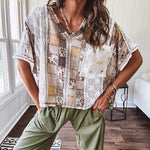 Lightweight and flowy beige patchwork printed tee with V neck, raw seams and cream lace inserts and floral crochet floral patch on the front pocket.