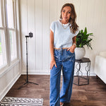 Light washed wide leg denim with front pockets, unique seam detail down the legs and drawstring waist.