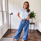 Light washed wide leg denim with front pockets, unique seam detail down the legs and drawstring waist.