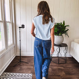 Light washed wide leg denim with front pockets, unique seam detail down the legs and drawstring waist.