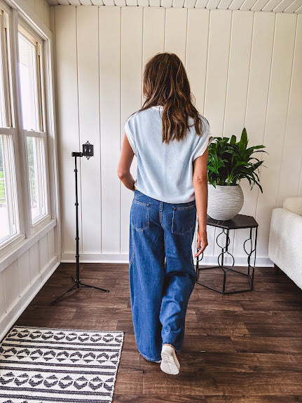 Light washed wide leg denim with front pockets, unique seam detail down the legs and drawstring waist.