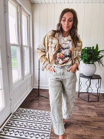 Soft oatmeal tee with retro inspired mushrooms in washed teal, red, spice and yellow with florals throughout and dotted with rhinestones.