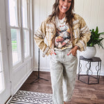 Soft oatmeal tee with retro inspired mushrooms in washed teal, red, spice and yellow with florals throughout and dotted with rhinestones.
