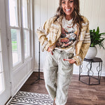 Soft oatmeal tee with retro inspired mushrooms in washed teal, red, spice and yellow with florals throughout and dotted with rhinestones.