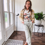 Soft oatmeal tee with retro inspired mushrooms in washed teal, red, spice and yellow with florals throughout and dotted with rhinestones.