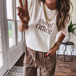 Ivory cotton tee featuring dark brown "Out of Office" and "Needing a Little Me Time Rest & Relaxation Office the Cock, 'bye!" graphics on the front and back.
