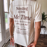 Ivory cotton tee featuring dark brown "Out of Office" and "Needing a Little Me Time Rest & Relaxation Office the Cock, 'bye!" graphics on the front and back.