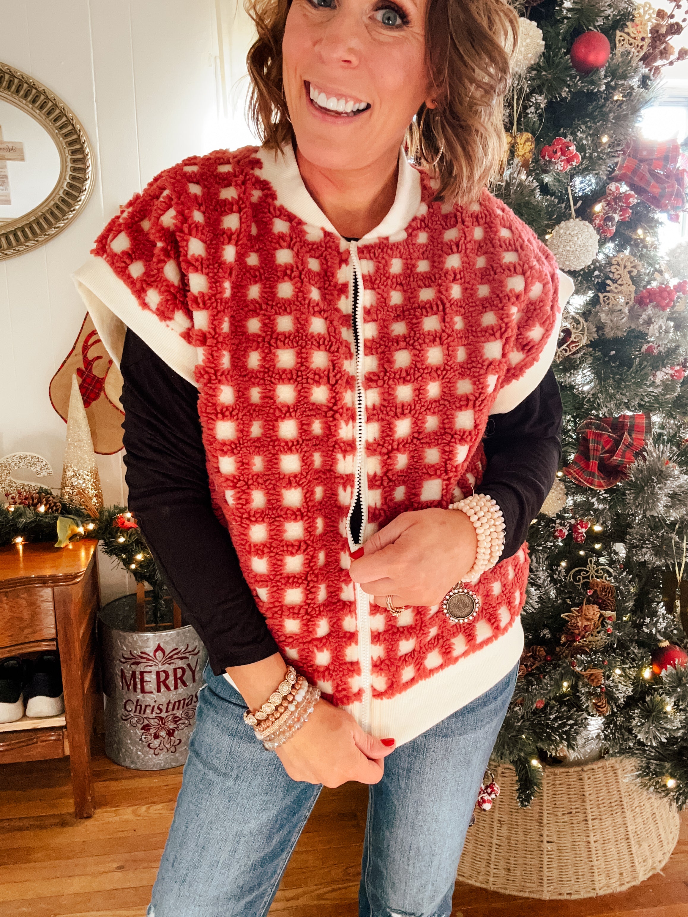 Burgundy and ivory window pane checkered sherpa vest with zipper front.
