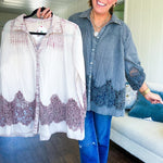 Lightweight washed long sleeved button down top with pleating at the yoke, lace detail on the sleeves and above the hem and elastic cuffs, flowy design.