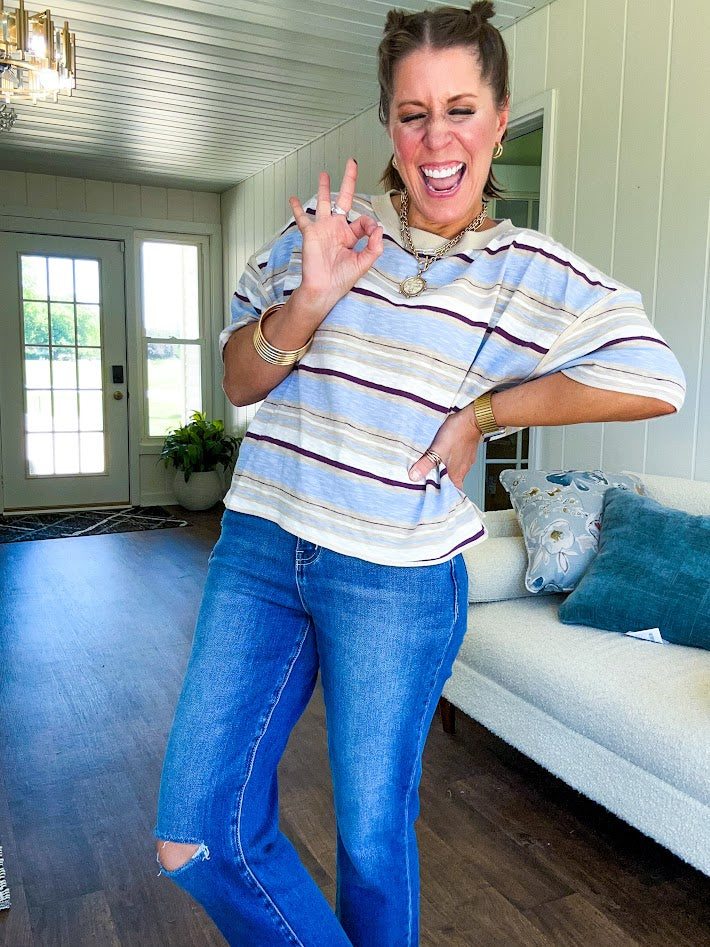 Taupe, light blue, mulberry and cream striped lightweight short sleeved tee with taupe trim at the round neck and seams and a boxy cut.