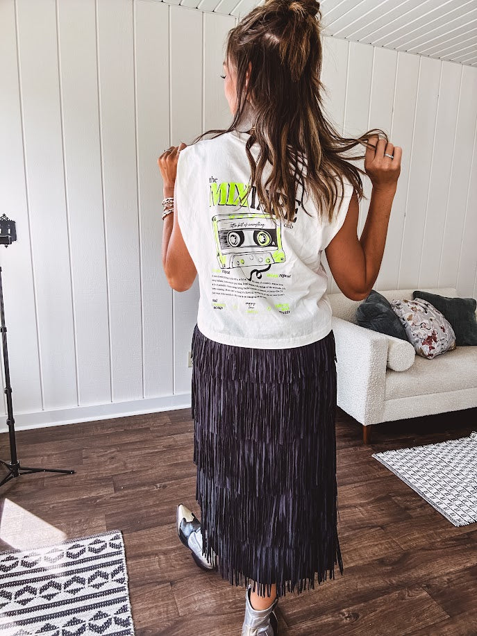 Soft, cream cotton muscle tank that's basically a love letter to the golden age of mixtapes. Rock the bold black "the Mixtape club" graphic up front, then flip around to reveal a striking black and neon yellow design featuring an actual tape and the real definition of what makes a mixtape so legendary