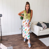 A western-inspired bias midi skirt that brings playful attitude to every outfit. Featuring a bold cowboy boot print on a creamy background, it's designed for effortless movement with a comfortable wide-band elastic waist and full lining