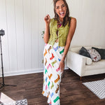 A western-inspired bias midi skirt that brings playful attitude to every outfit. Featuring a bold cowboy boot print on a creamy background, it's designed for effortless movement with a comfortable wide-band elastic waist and full lining