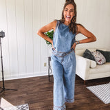 Light wash denim set that's equal parts effortless and eye-catching. The tank features a hook-and-eye neck closure and loose hem, while caramel embroidered stitching adds personality throughout. Pair it with the matching wide-leg pants—complete with button-zip closure, elastic back waist, front and side pleating, and pockets lined with the same playful embroidered detail.