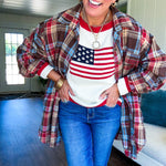 Oversized red, brown and blue plaid button down top.