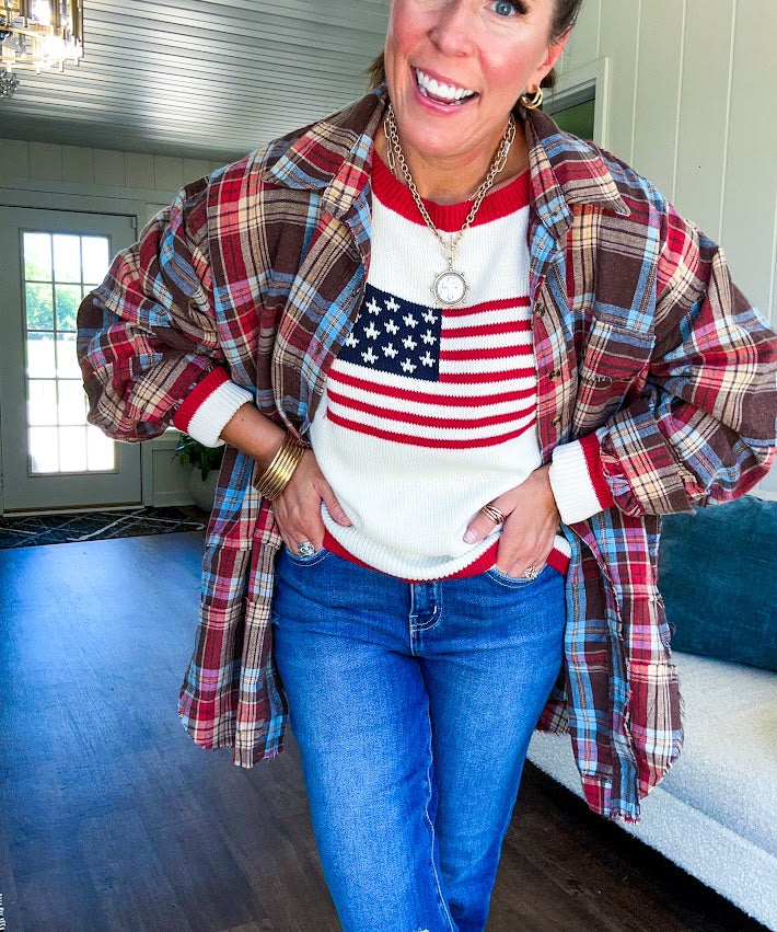 Oversized red, brown and blue plaid button down top.