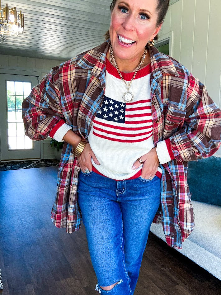 Oversized red, brown and blue plaid button down top.