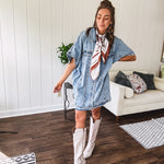 Denim Diva energy meets versatile style. This batwing beauty shifts from jacket to shirt to dress—layer it over everything or let it stand solo. Medium wash, metal button details, and flattering seam work make it endlessly cool. 